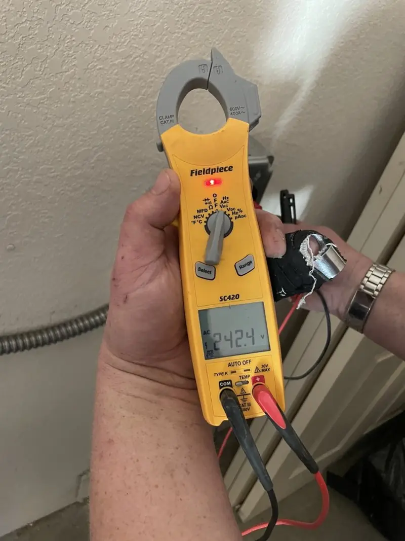 Voltage testing with clamp meter during Hot Tub / Pool Electrical Wiring in Del City